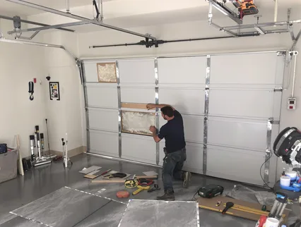 Garage Door Panel Repair in Griswold