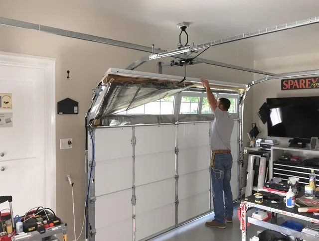 Garage door section replacement by Griswold Garage Door Repair in Griswold