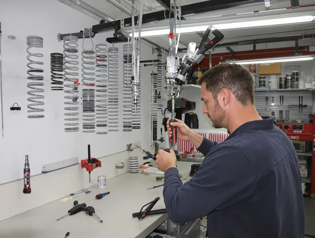 Griswold Garage Door Repair safety certified technician performing precision spring replacement in Griswold